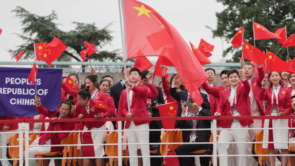 Ma Long bearing the flag